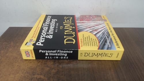 Yellow and brown “Personal Finance & Investing For Dummies” book, side view.