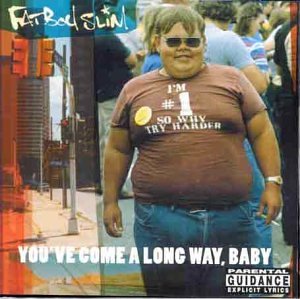 Album cover featuring a man wearing sunglasses and a brown shirt with text.