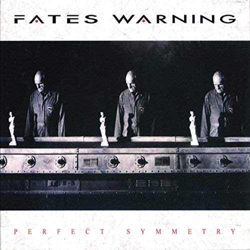 "Album cover with three bald men standing behind a control panel."