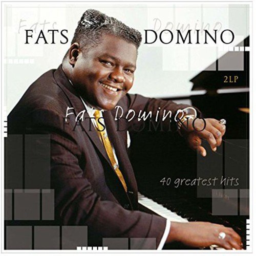 Fats Domino album cover featuring a man at a piano, smiling.