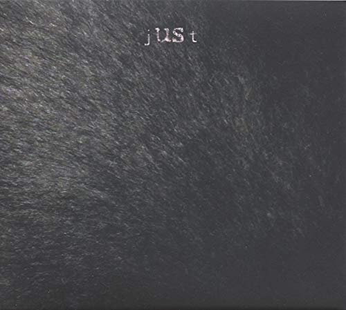 Black CD case with the word "just" embossed in silver lettering.