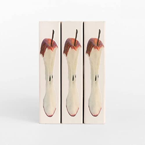 Three CD cases with images of partially eaten red apples.