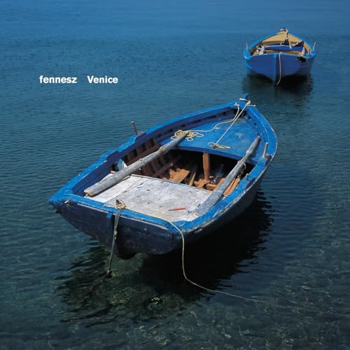 CD cover: two small, blue wooden boats on calm water.