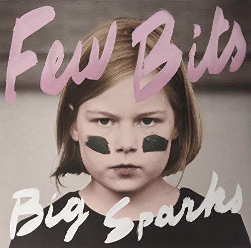 Vinyl album cover featuring a young girl with dark markings on her face.