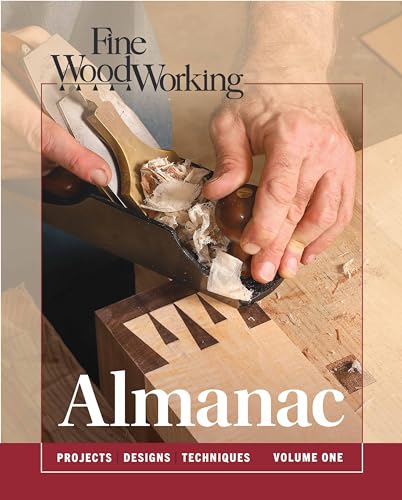 Cover of "Fine Woodworking Almanac, Vol 1" showing a hand planing wood.