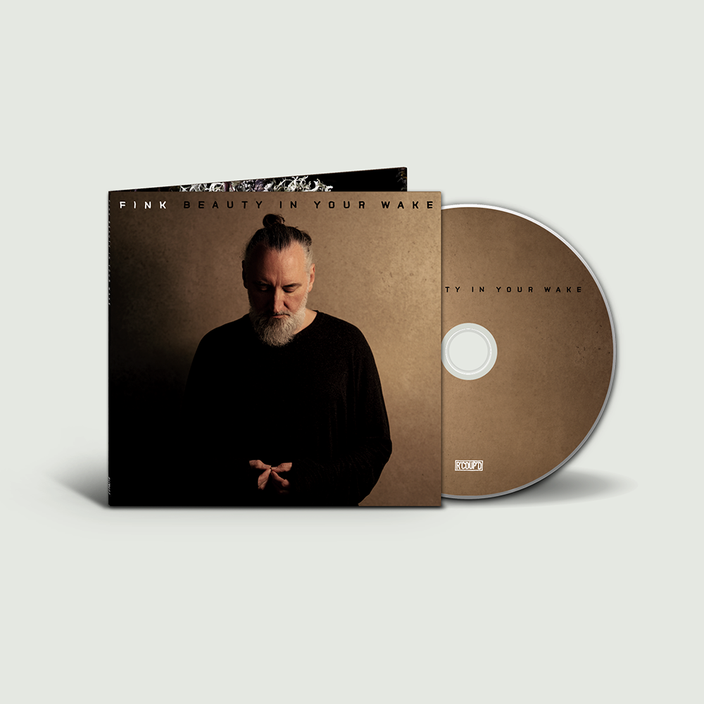 CD case and disc for Fink’s “Beauty In Your Wake” album, with portrait.