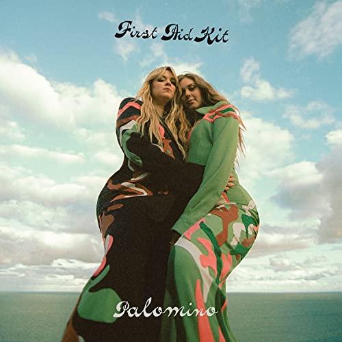 Album cover for First Aid Kit’s “Palomino” featuring two women embracing.
