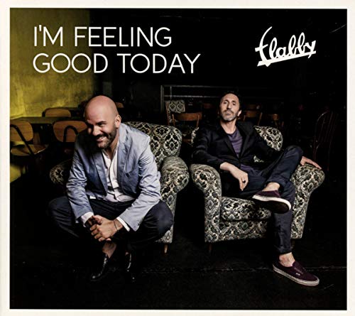 CD cover: two men seated in patterned armchairs, dark background.