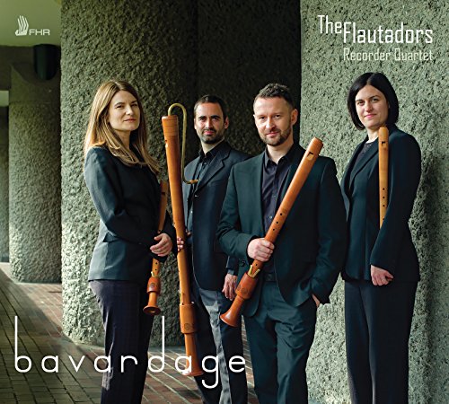 Four musicians with recorders stand in front of a concrete building.