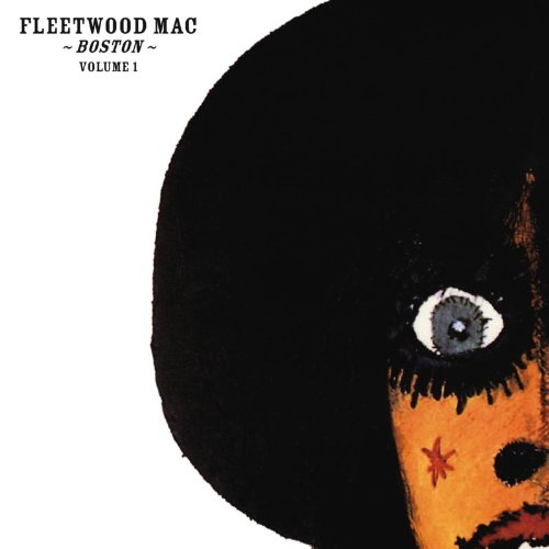 "Album cover art featuring a close-up of a person's face with large black hair."