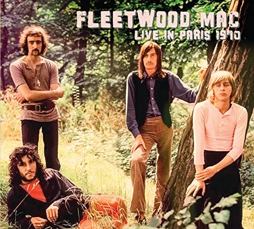 Fleetwood Mac band members pose in a wooded area for their Live in Paris album.