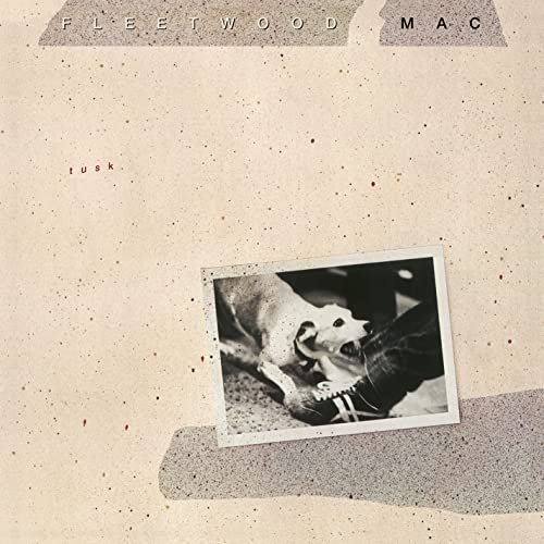 Fleetwood Mac’s “Tusk” CD cover with a dog and human leg image.