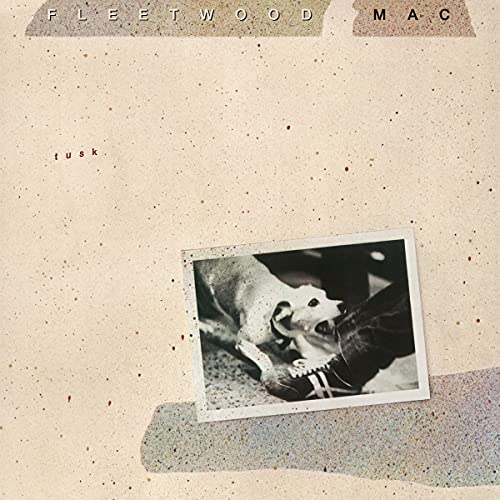 Fleetwood Mac's "Tusk" vinyl cover: a dog biting a boot, textured background.