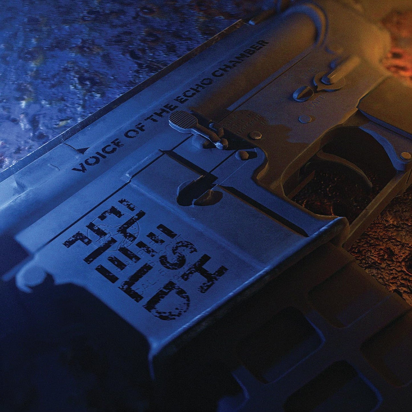 CD case resembling a gun with distorted text and shadows.