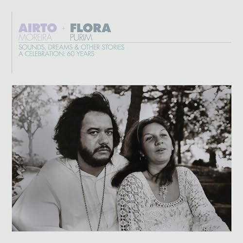 Black and white photo of Airto Moreira and Flora Purim with album title text above.