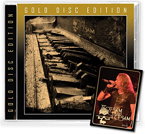 CDSL CD case with a decayed piano cover and a singer's photo insert.