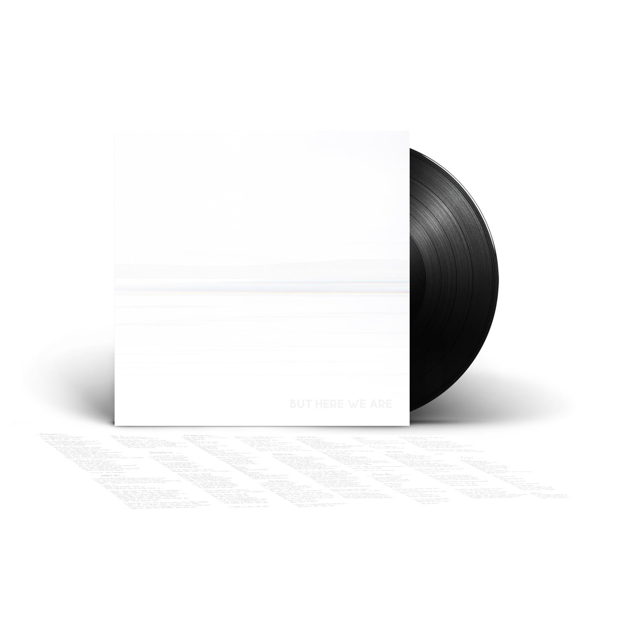 Foo Fighters "But Here We Are" vinyl record with white cover.