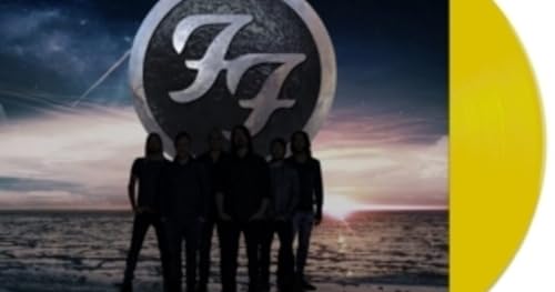 Foo Fighters “Heroes” vinyl record with yellow disc and band silhouette.