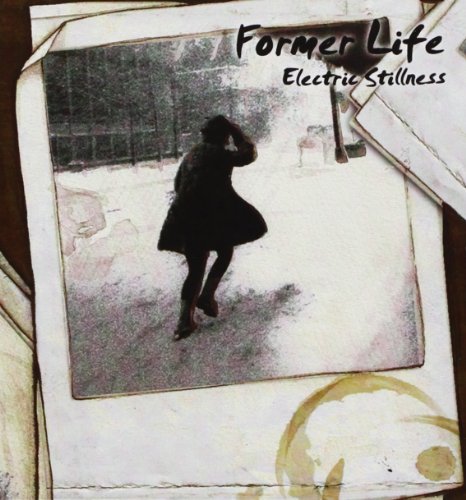 CD cover: Silhouette of a person walking in a snowy, blurred landscape.