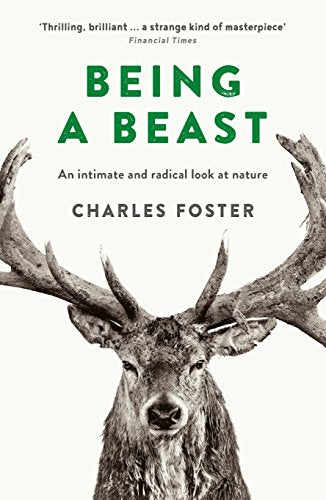 Book cover for Being a Beast by Charles Foster featuring a stag's head.