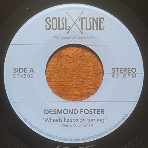 Vinyl record label for Desmond Foster’s “Wheels Keeps On Turning.”