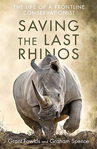 Book cover featuring a close-up of a rhinoceros in a grassy landscape.