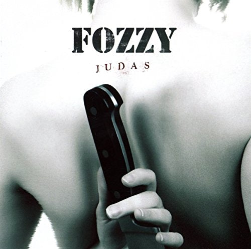 A person holds a large knife behind their back, with Fozzy Judas text above.