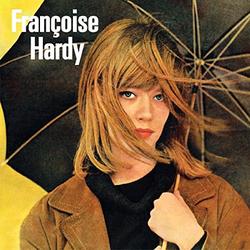 Françoise Hardy with windblown hair holding a black and yellow umbrella, album cover art.