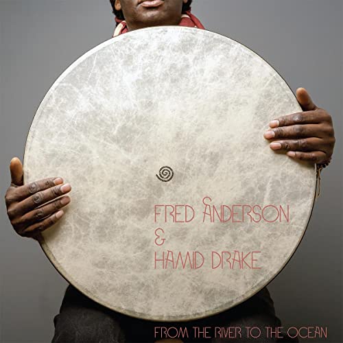Album cover: Fred Anderson holding a large, round frame drum.