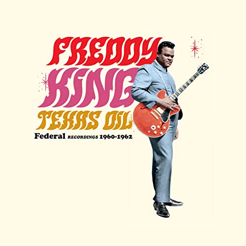 Freddy King album cover: man with red guitar, retro text design.