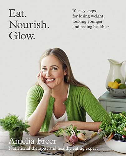 Book cover with woman, vegetables, and text: "Eat. Nourish. Glow." by Amelia Freer.