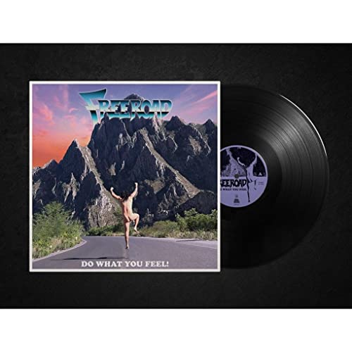 Vinyl record and album cover featuring a person running toward mountains.