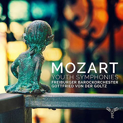 CD cover featuring a bronze statue of a child and āMozartā text.