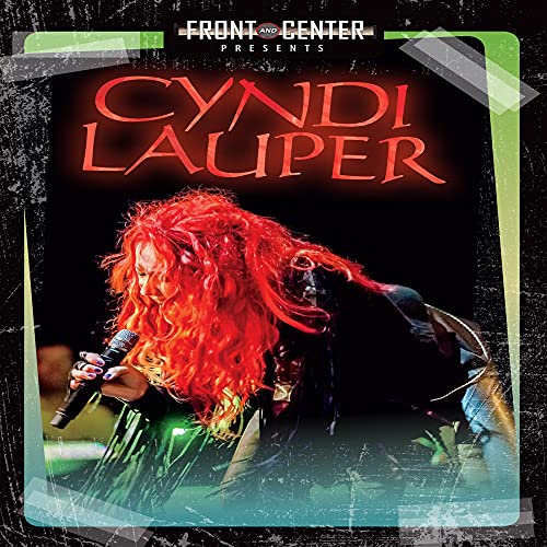 Cyndi Lauper performing with a microphone, featured on a Blu-ray cover.