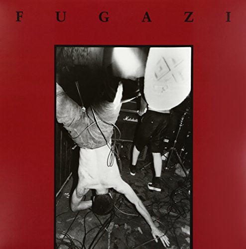 Album cover featuring a black and white photo of a musician performing upside down.