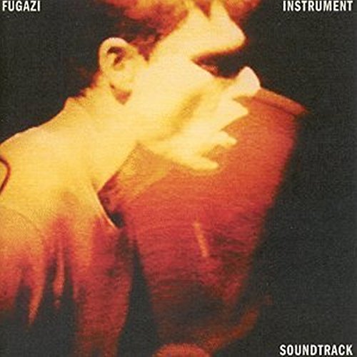 Fugazi “Instrument” CD cover: close-up of a singer in warm tones.