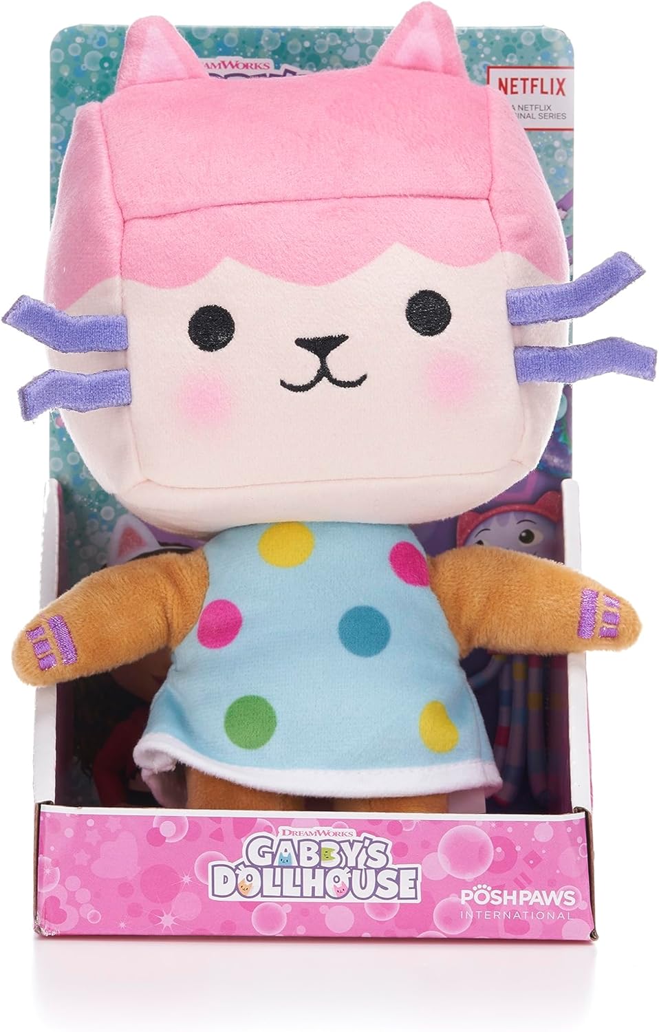 Gabby's Dollhouse plush toy with pink cat ears and a blue polka dot dress.
