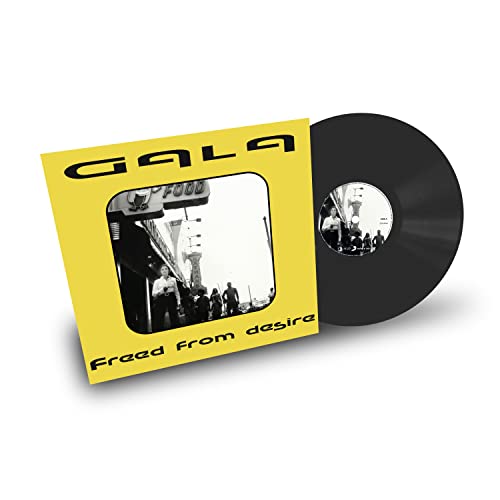 Yellow vinyl record cover with black record, street scene image.