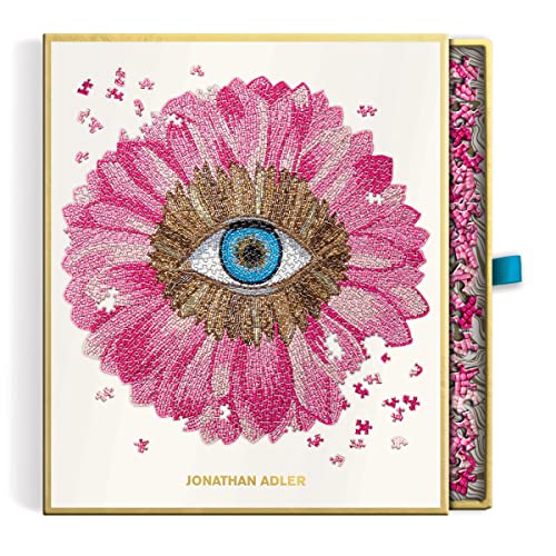 Pink floral puzzle with a central blue eye design, in a gold box.
