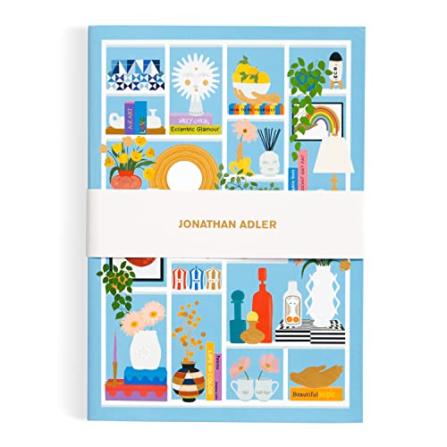 Blue journal with colorful shelf illustration and “Jonathan Adler” text.
