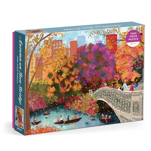 Puzzle box depicting a colorful autumn scene with a bridge and boats.