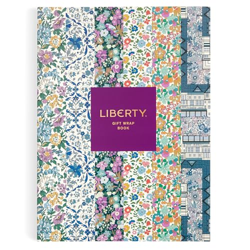 Liberty gift wrap book with a purple center label and colorful floral patterned panels.