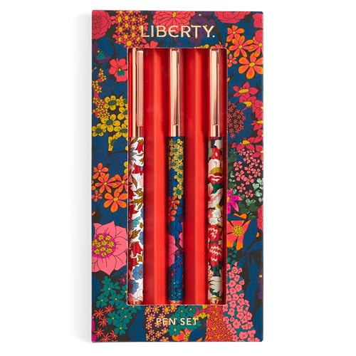 Three floral-patterned pens in a rectangular box with a colorful Liberty London flower print.