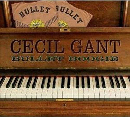 Antique piano with album cover for Cecil Gant’s “Bullet Boogie.”