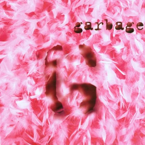 The Garbage self-titled album cover features dark text over a background of pink feathers.