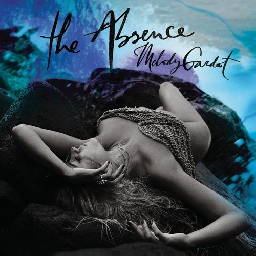 Album cover for Melody Gardot’s “The Absence” featuring a reclining woman.