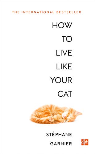 Book cover with large text “How to Live Like Your Cat” and a sleeping orange cat.