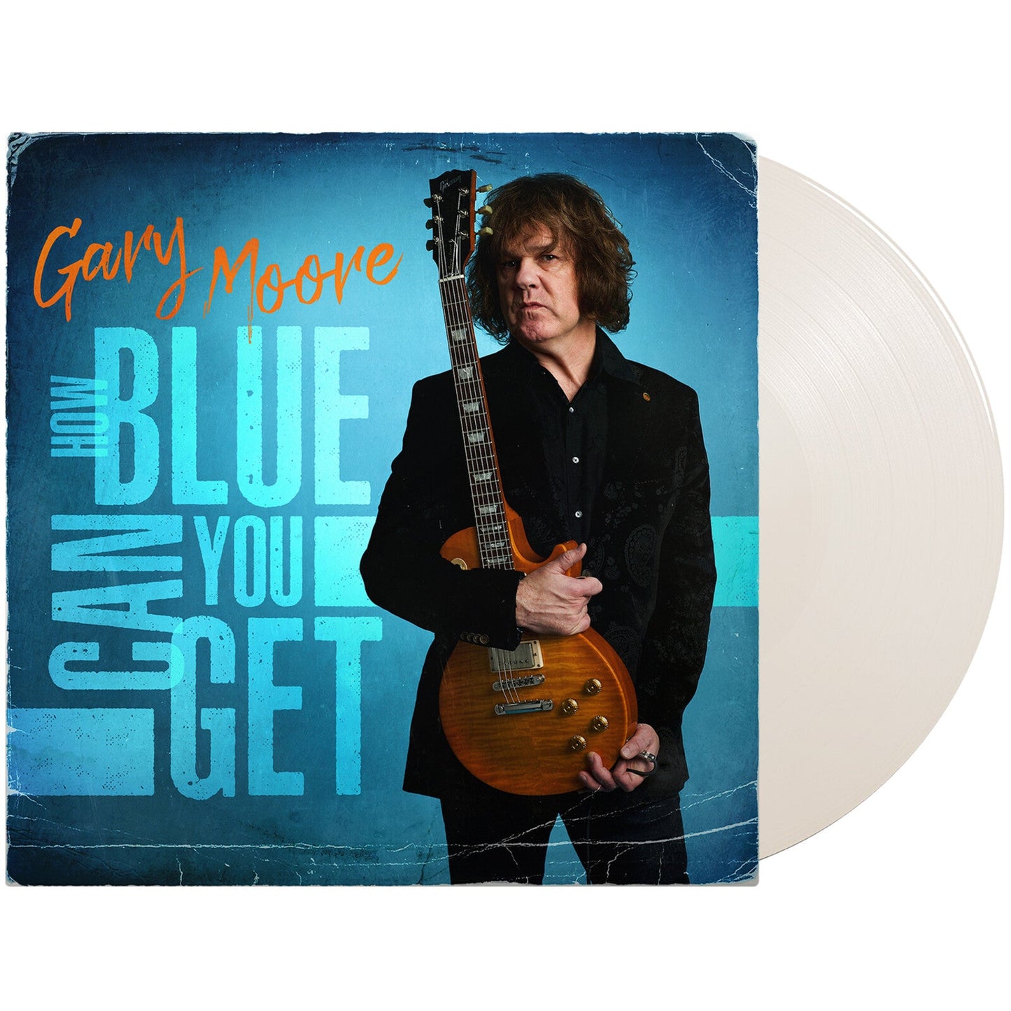 Gary Moore album cover with guitarist and vinyl record shown.