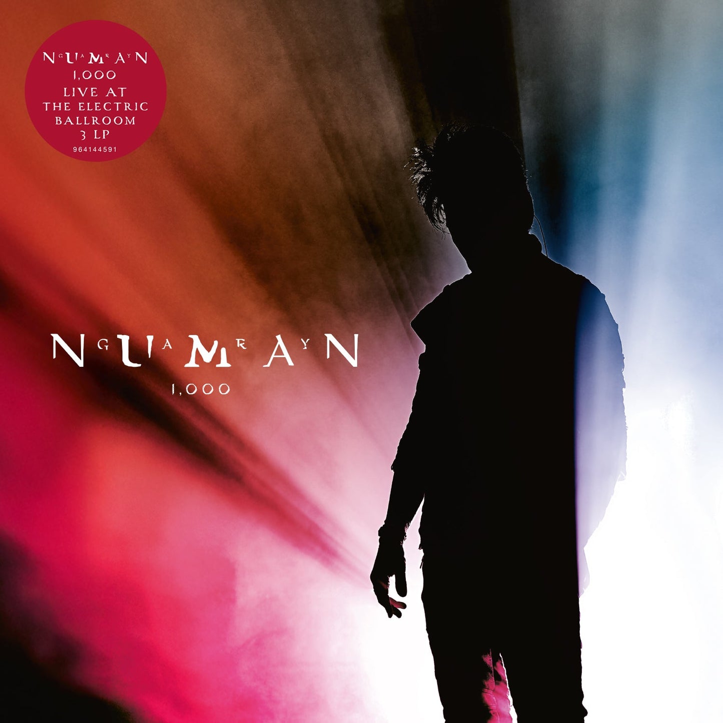 Gary Numan album cover: a silhouetted figure against a colorful, blurred background.