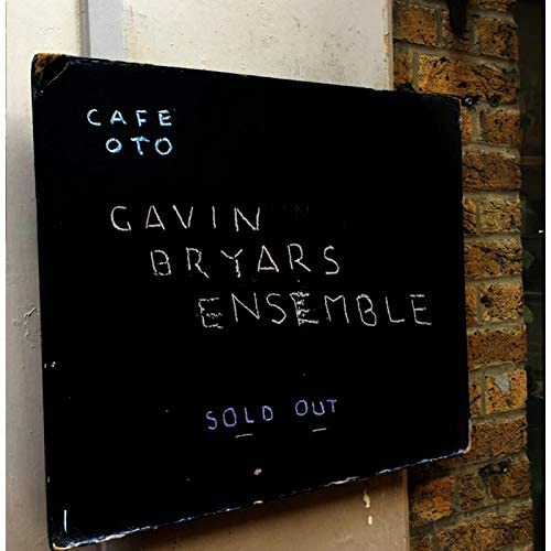 Black chalkboard displaying “Gavin Bryars Ensemble” and “Sold Out” text.
